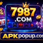 7987 Game APK promotional banner with casino-themed design, golden crown, playing cards, slot machine, coins, and APKpopup.com branding.